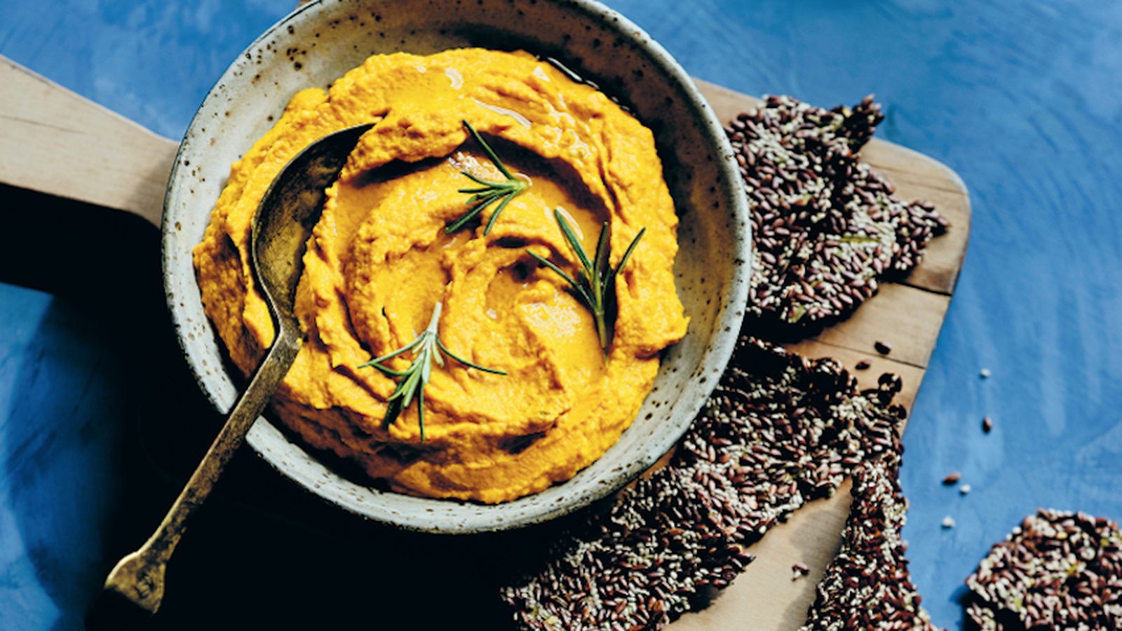 Carrot Hummus with Rosemary Linseed Crackers