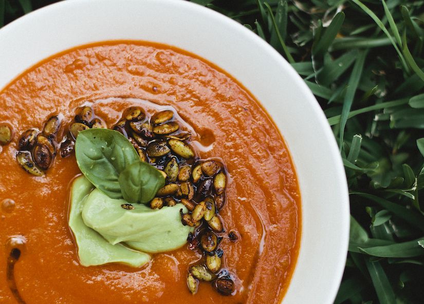 Roasted Tomato & Red Lentil Soup With Spicy Pepitas & Avocado Cream (Recipe) | FOOD MATTERS®